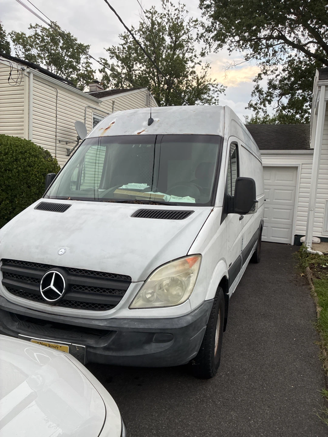 White Mercedes-Benz Sprinter Van