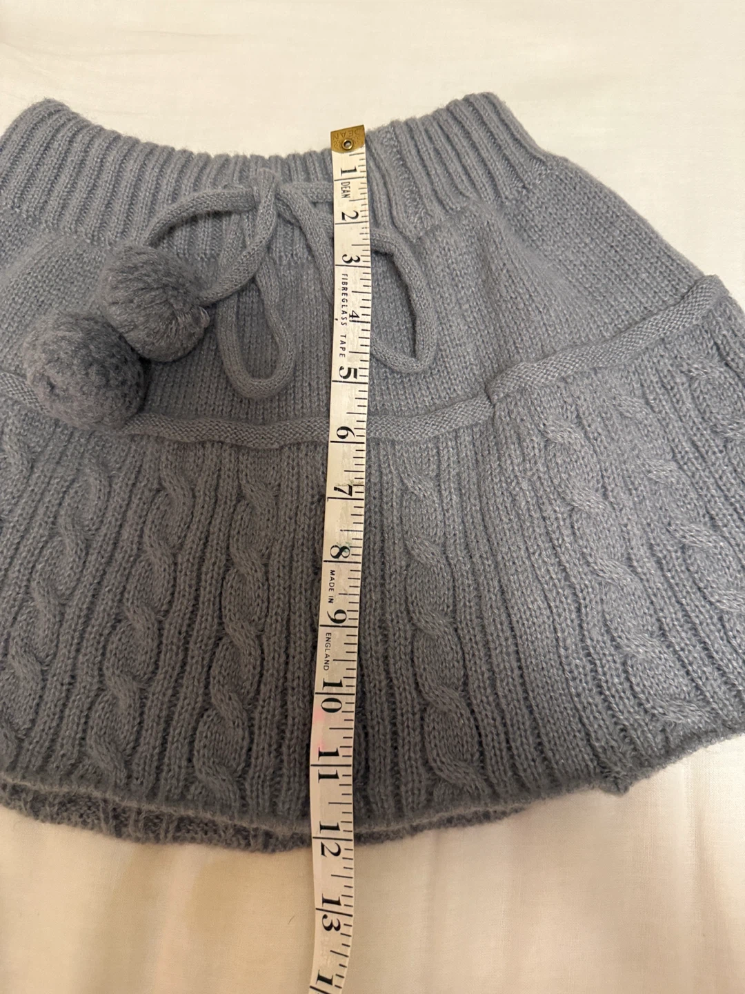 Grey knit mini skirt with pom pom ribbon detail - photo 4