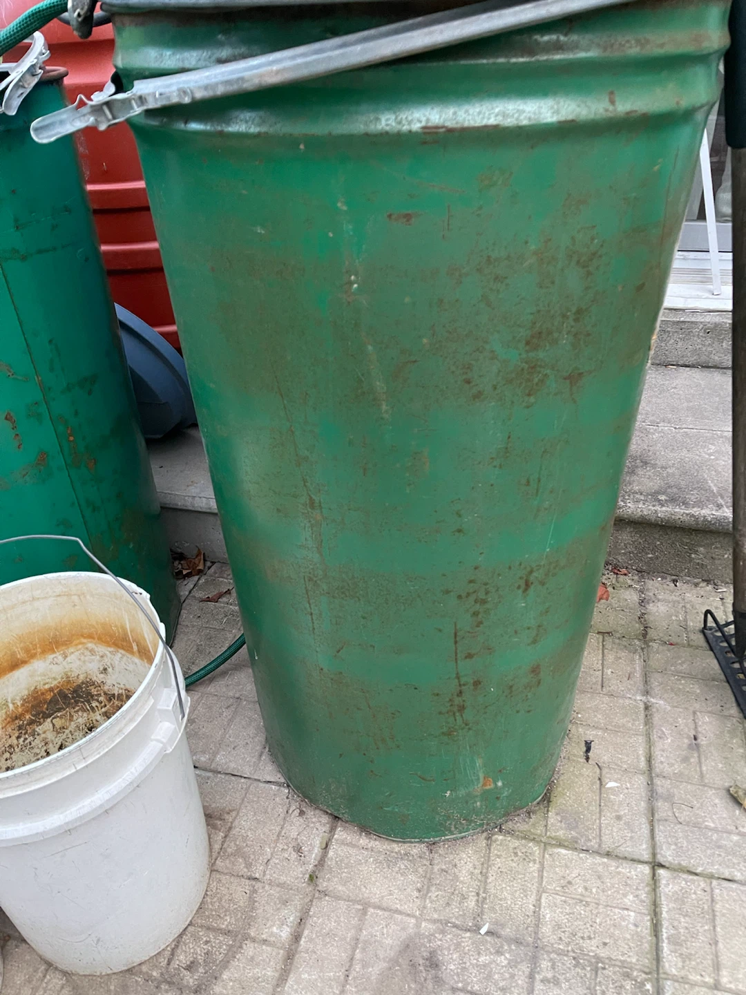 $10 each . Large Green Metal Drum with Tap
