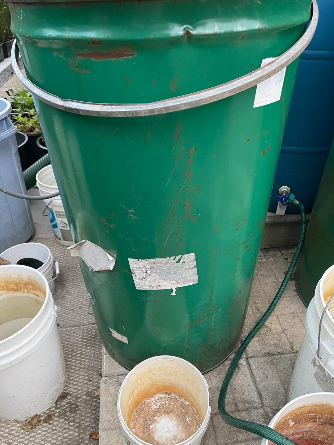 $10 each . Large Green Metal Drum with Tap - photo 2