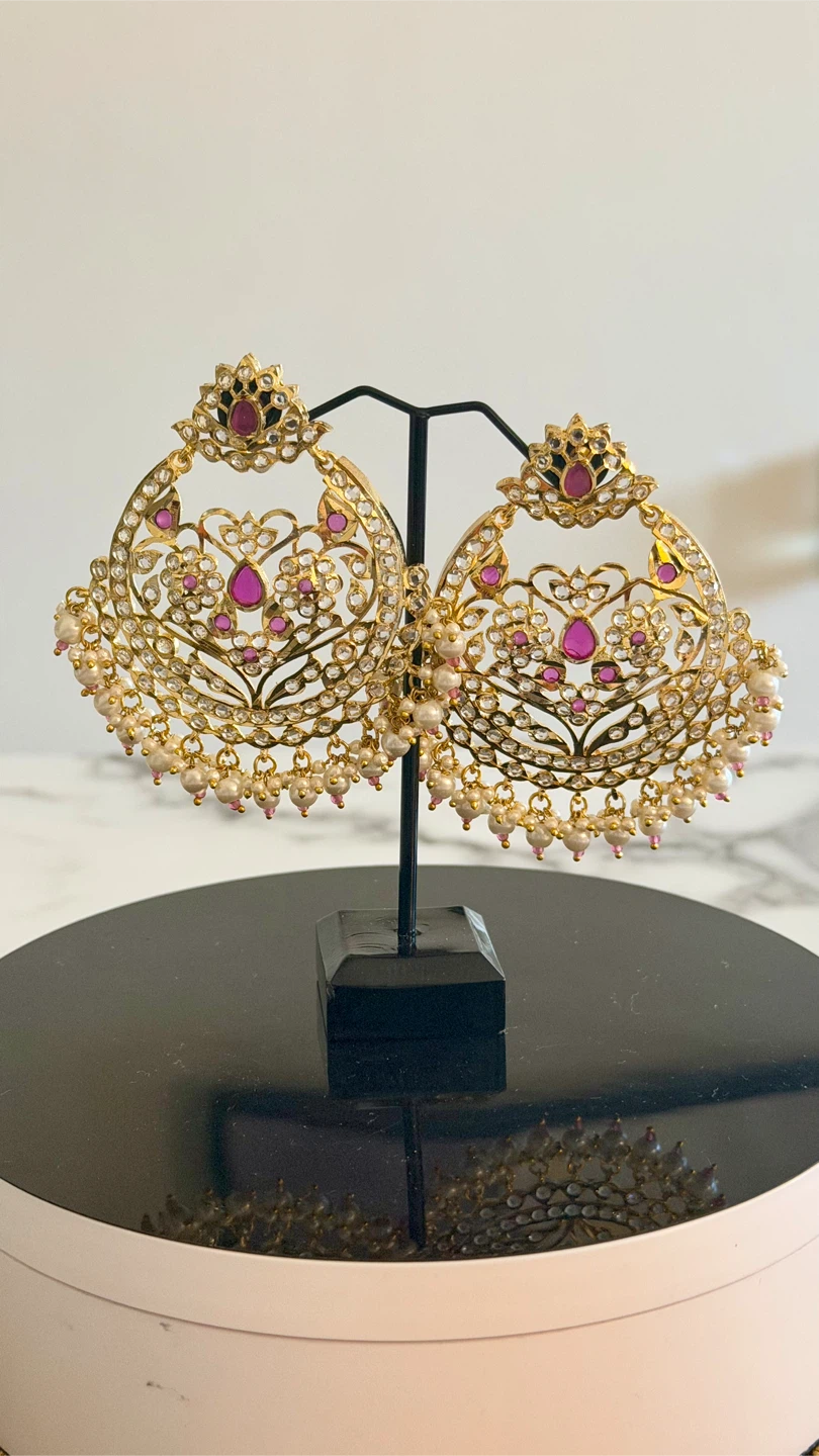 Gold-tone statement earrings with pearls and pink stones