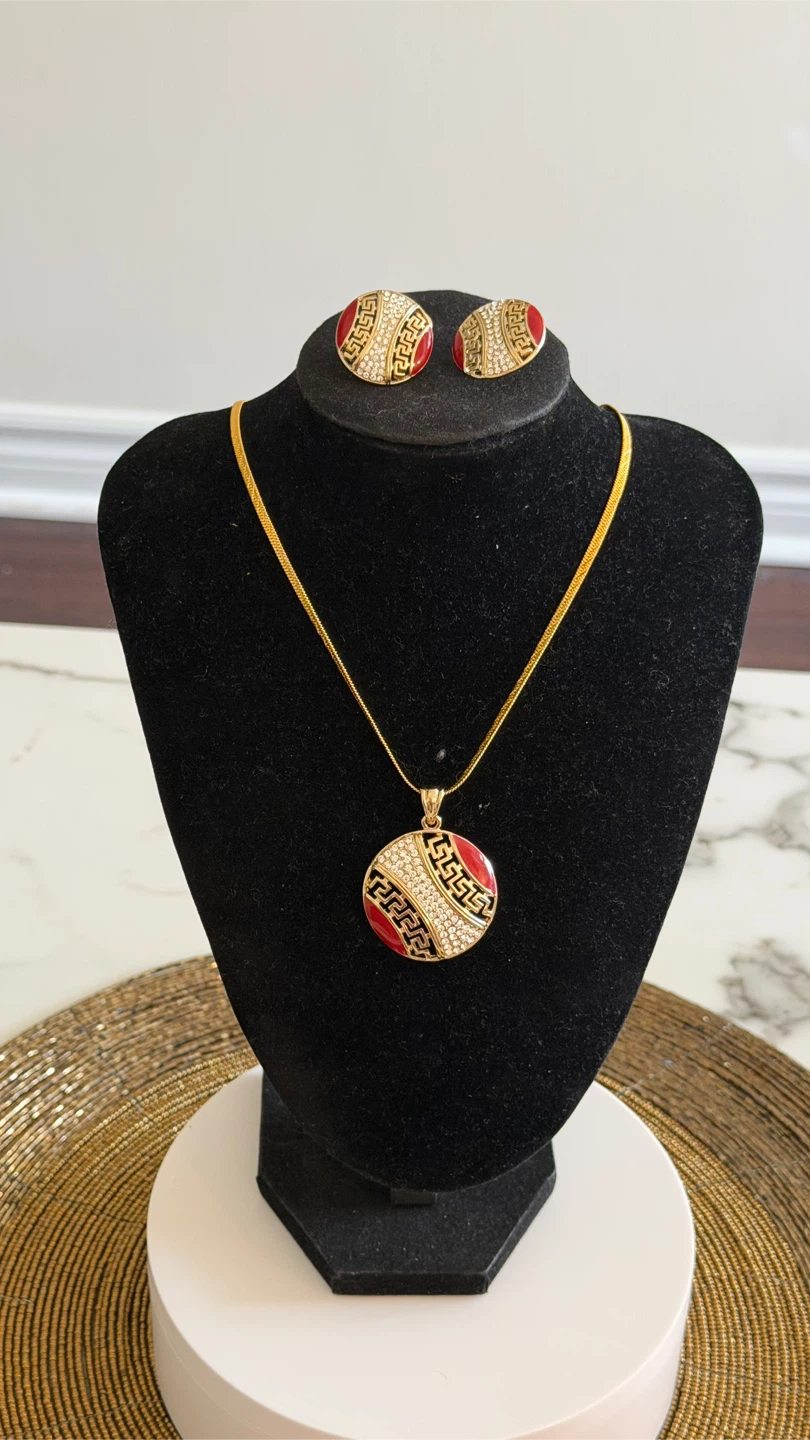 Gold Tone Necklace and Earring Set with Red and Crystal Accents