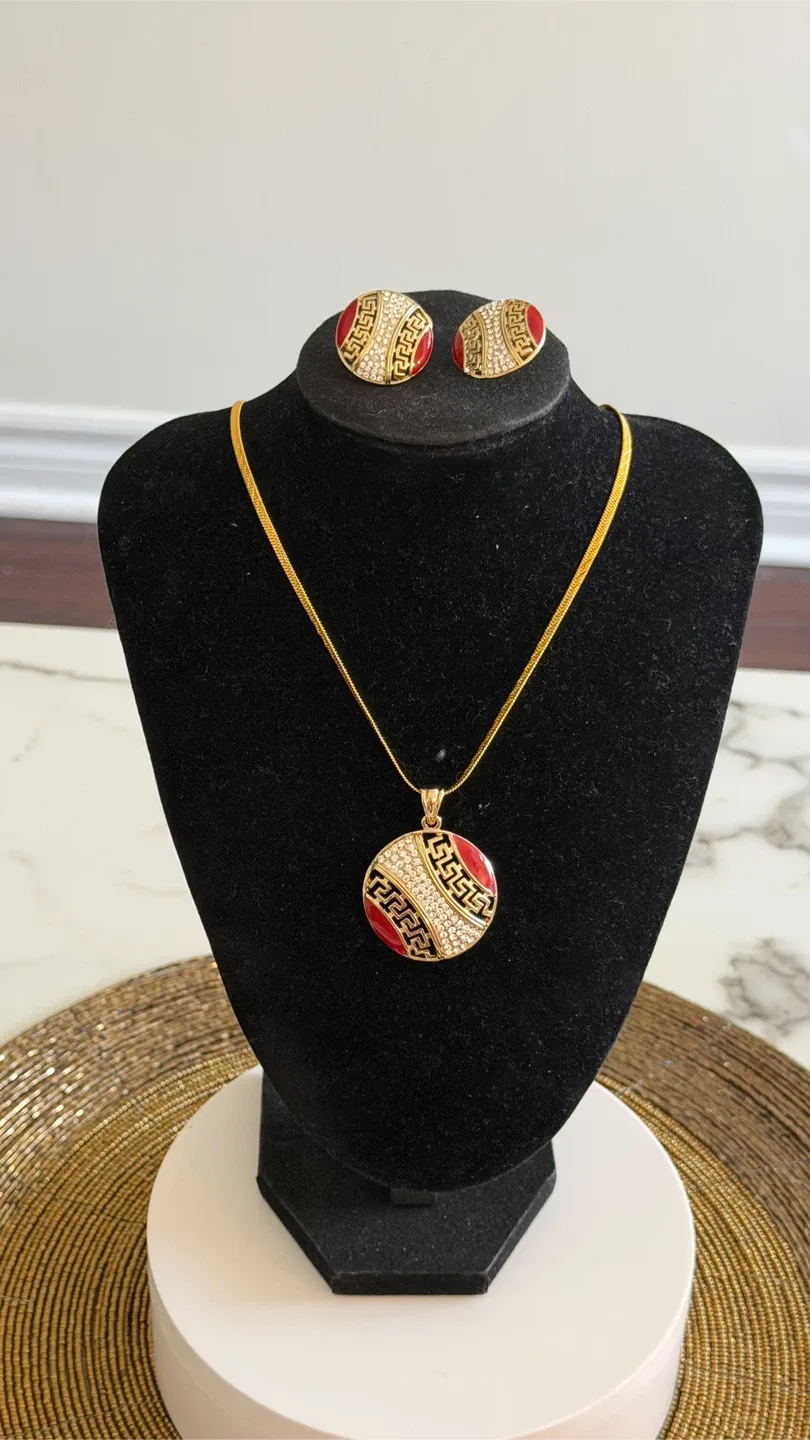 Gold Tone Necklace and Earring Set with Red and Crystal Accents