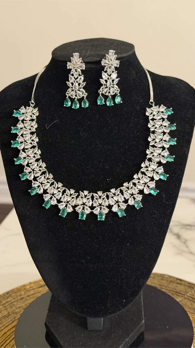 Silver-tone necklace and earring set with green stones
