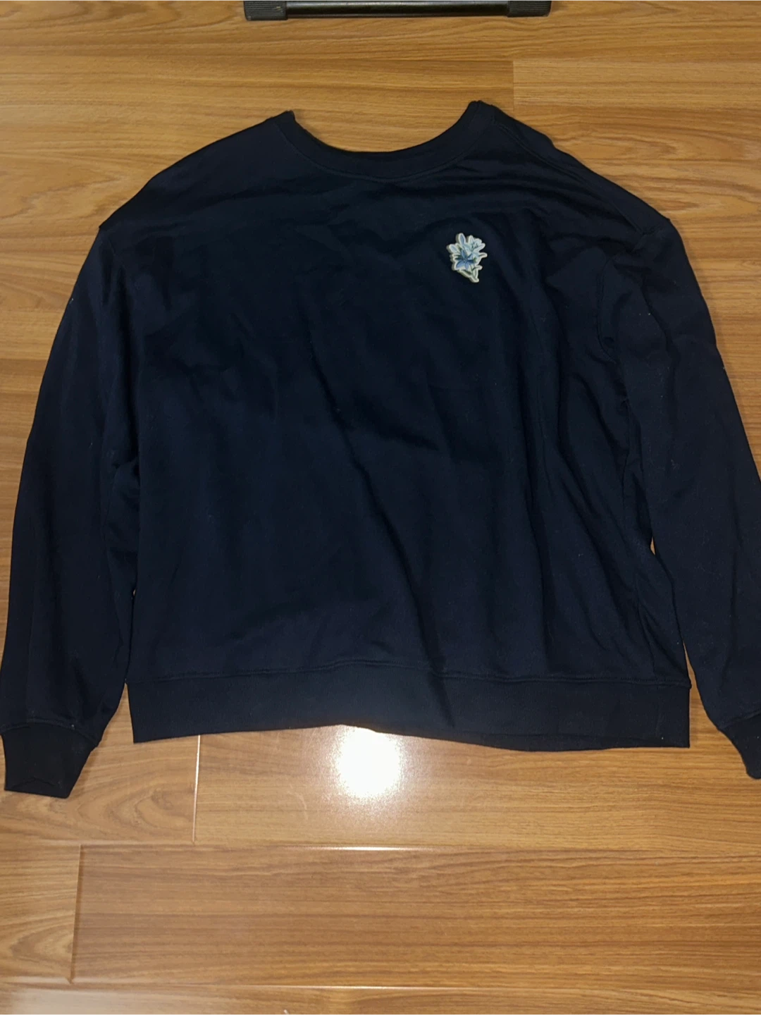 Navy Blue Sweatshirt with Floral Detail