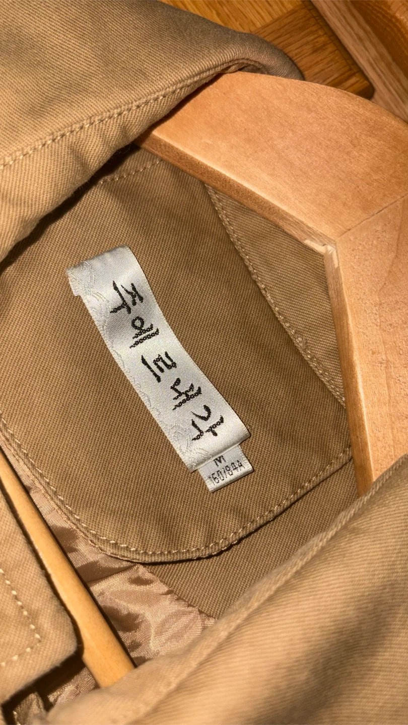 Tan Double-Breasted Trench Coat with Knit Sleeves