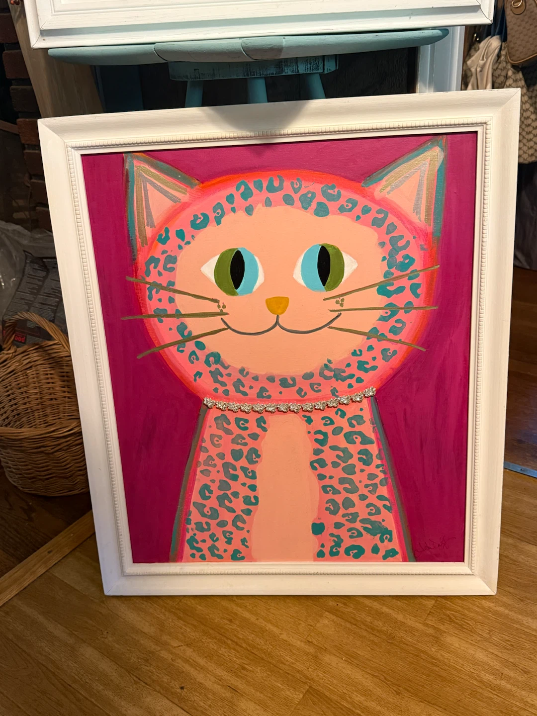 Framed pink cat painting