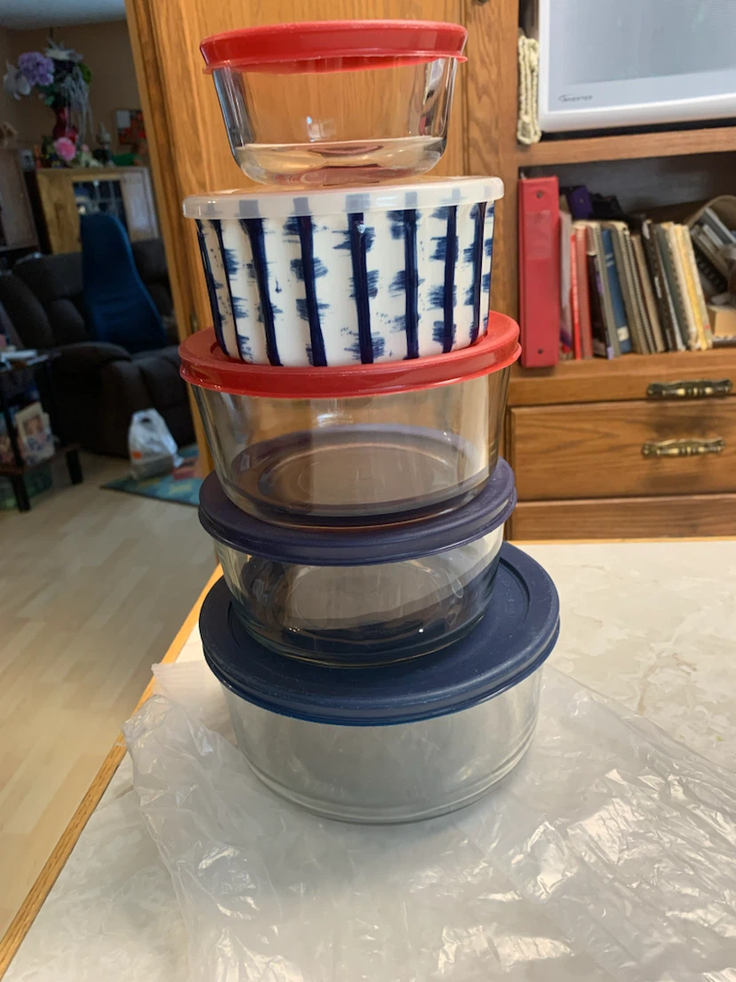 5 Five glass balls with plastic lids