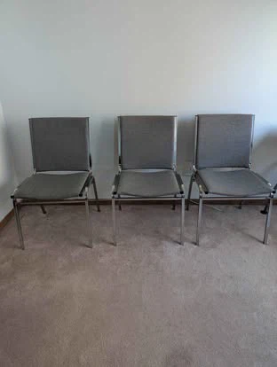 Set of 3 grey stacking chairs