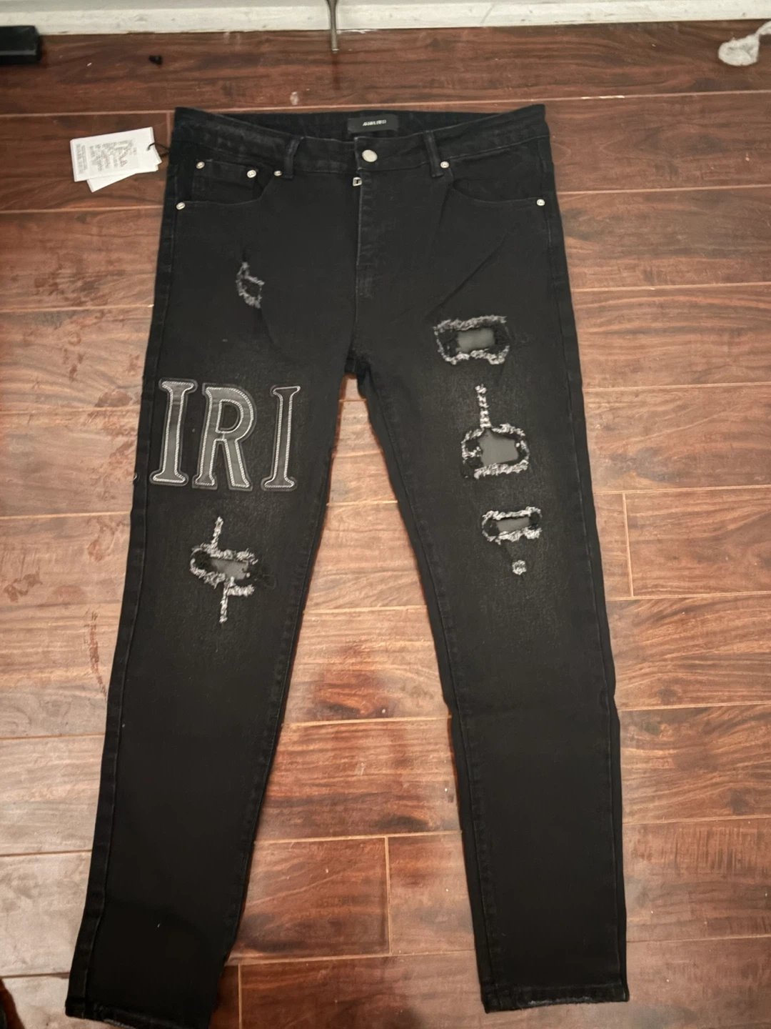 AMIRI Black Distressed Denim Jeans (size 33)