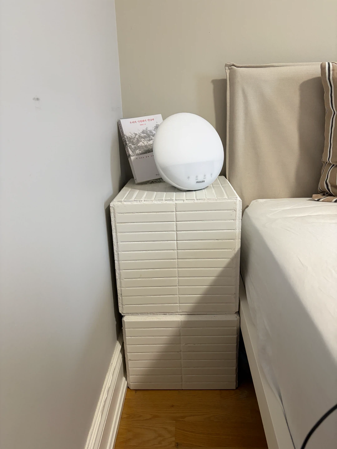 Two stacked white tile side table