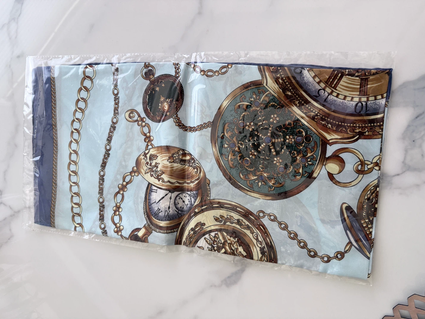 Silk scarf 34” wide.
