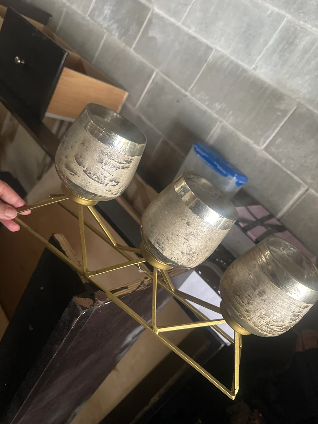 Three-light gold candle holder