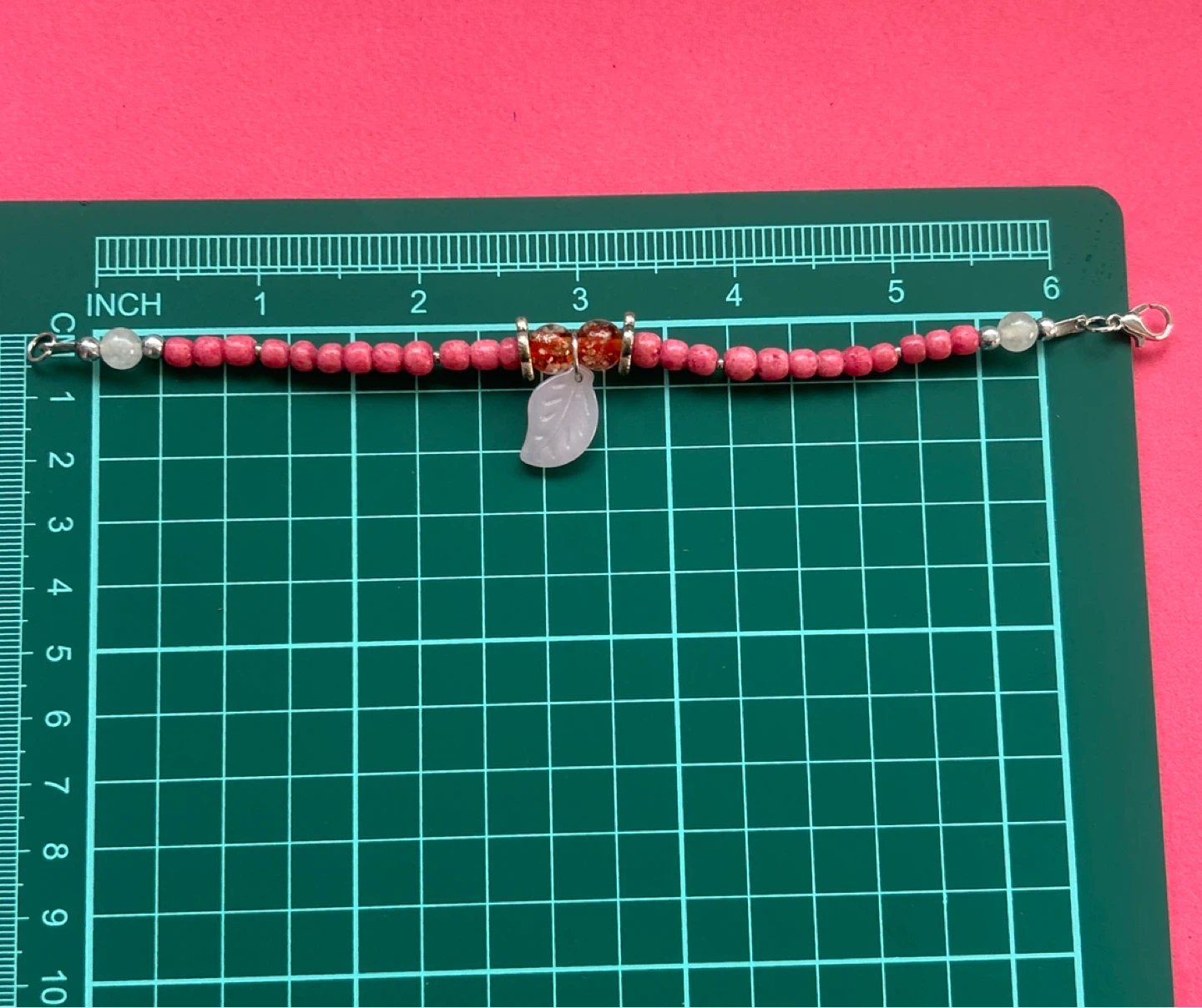 Pink Beaded Bracelet with Leaf Charm