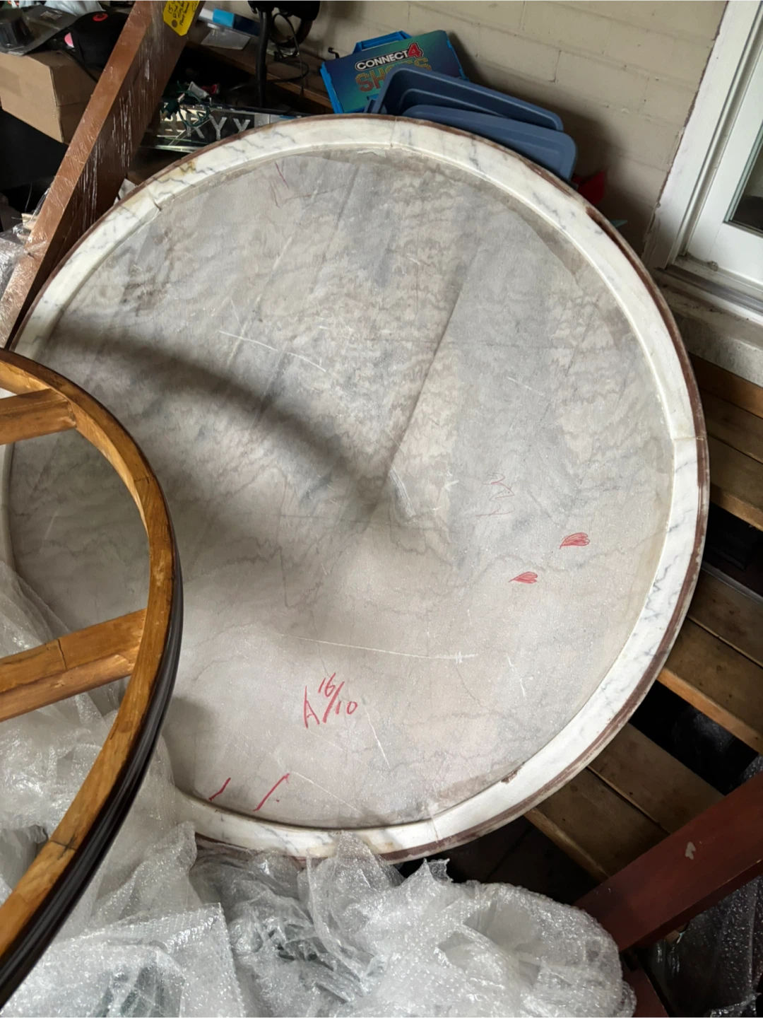 Round marble top dining table with lazy Susan