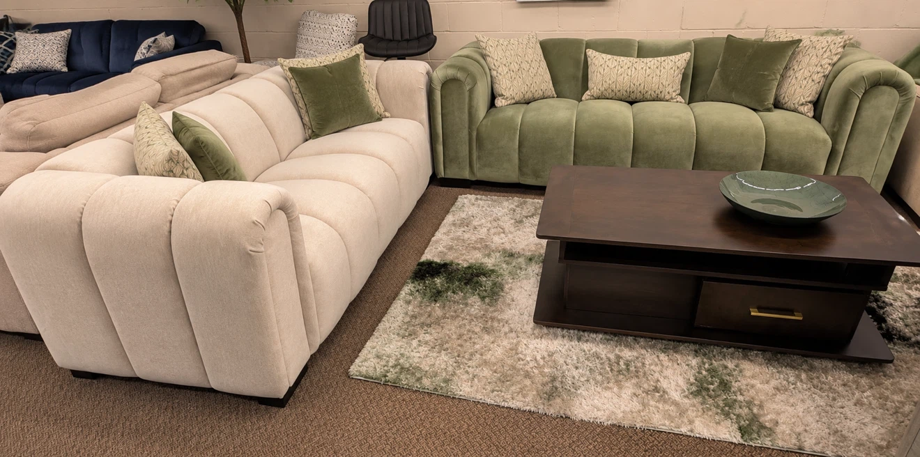 Cream Channel Tufted Sofa with Green Accent Pillows