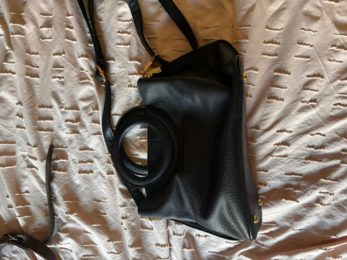 Black structured handbag with crossbody strap