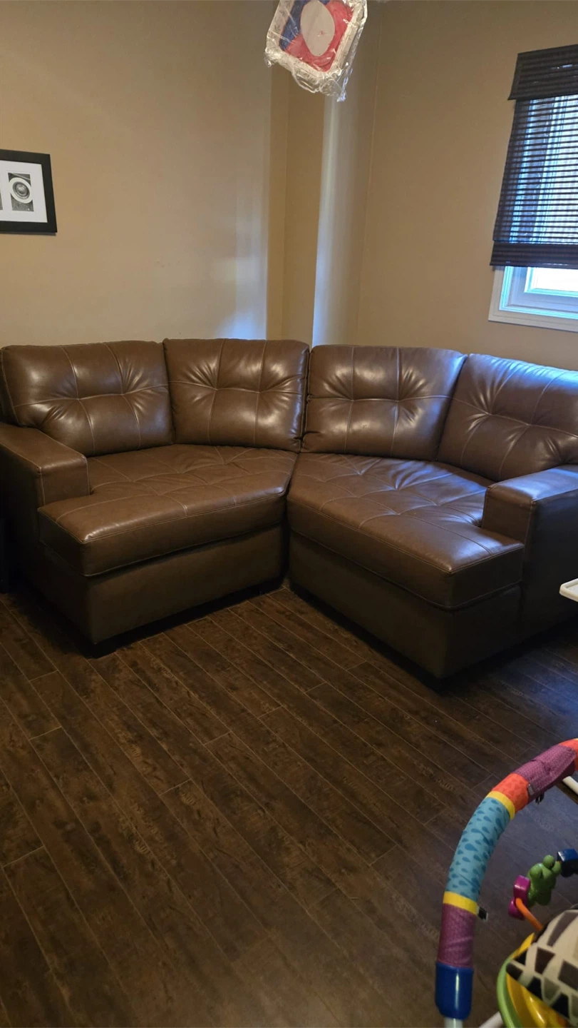 Brown Faux Leather sectional / cuddler couch