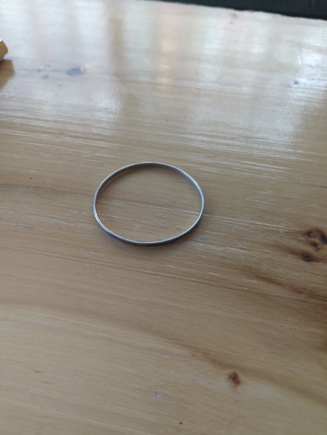 Silver coloured bangle