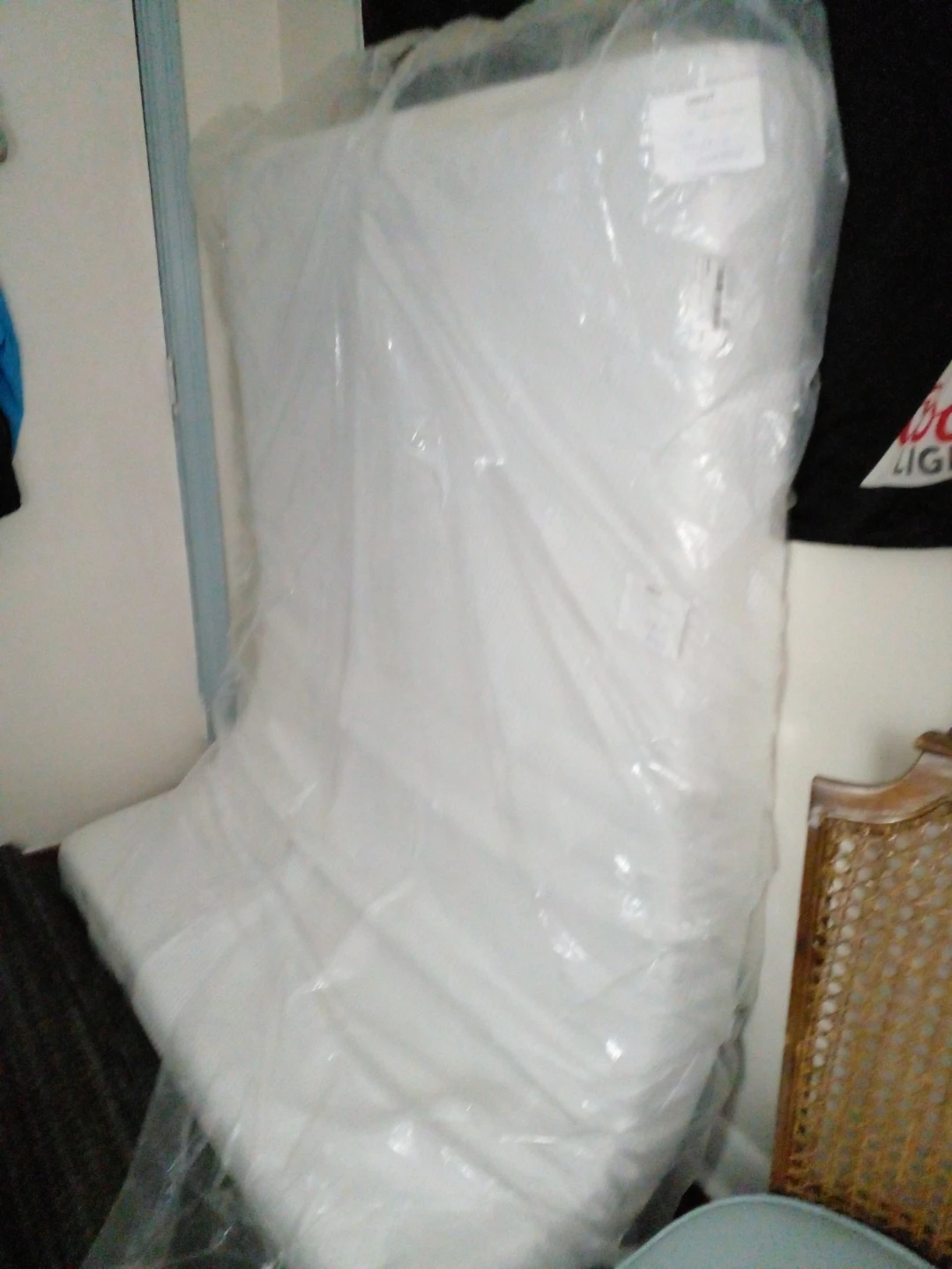 Mattress in plastic wrap