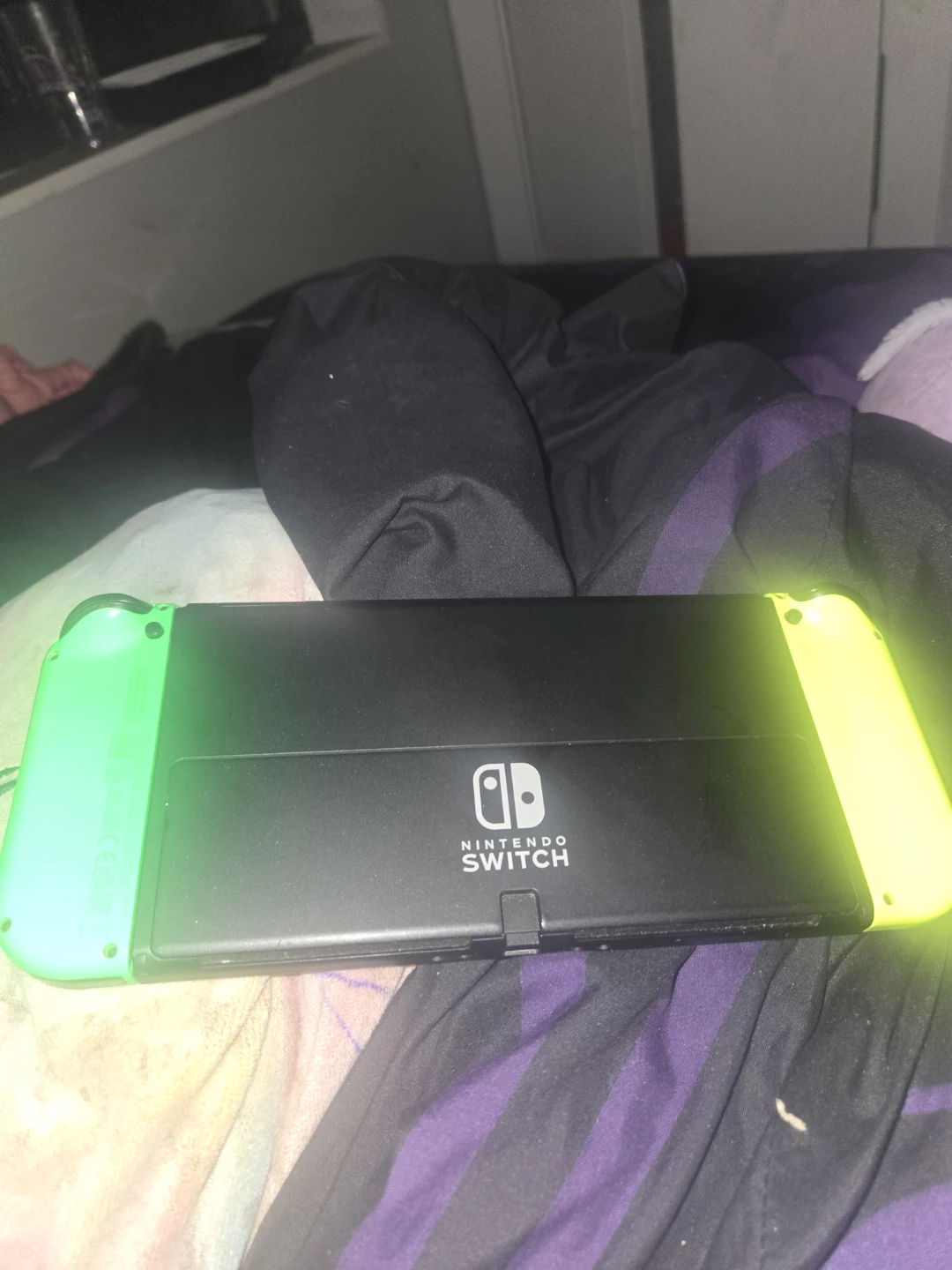 Nintendo Switch Oled Console with Neon Green and Yellow Joy-Cons
