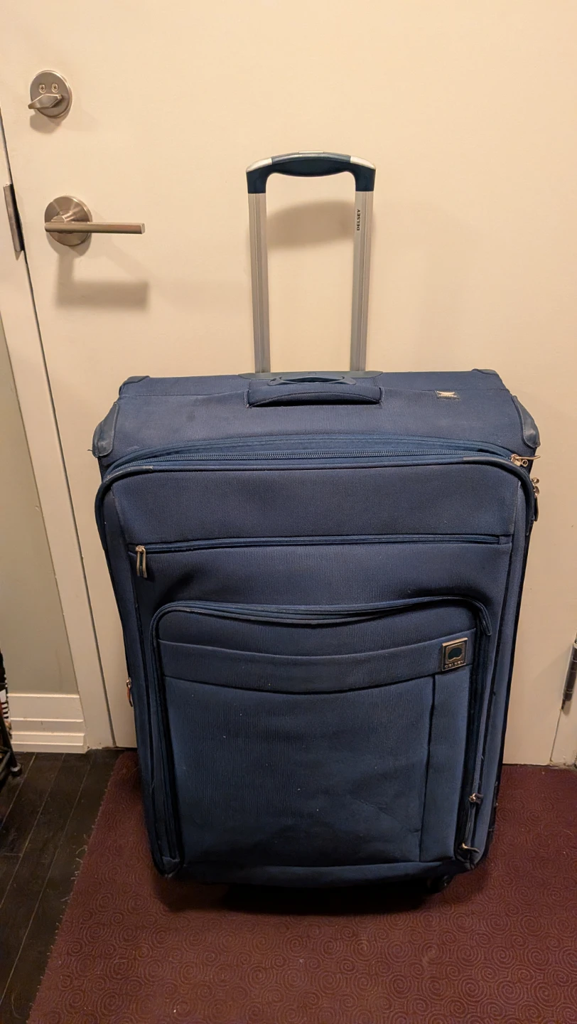 Delsey Blue Softside Spinner Luggage