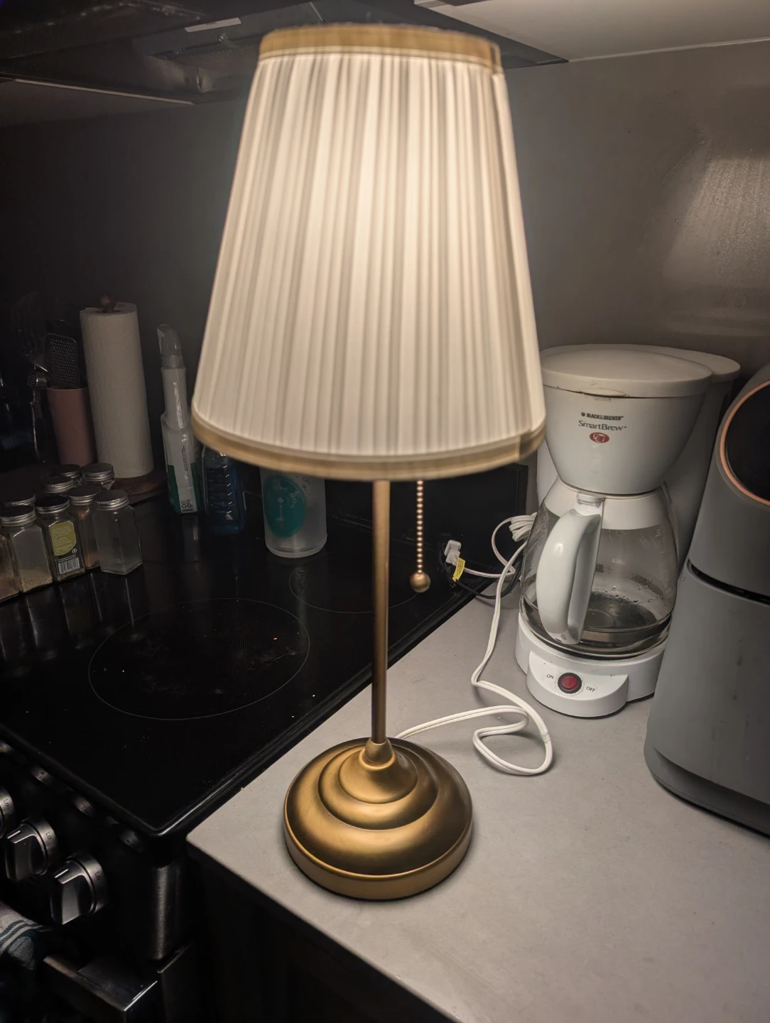 Ikea gold bedside lamp ("Arstid")
