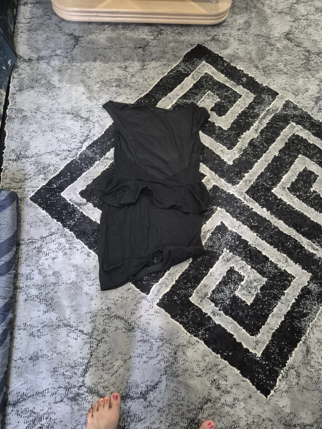 Black sleeveless peplum dress