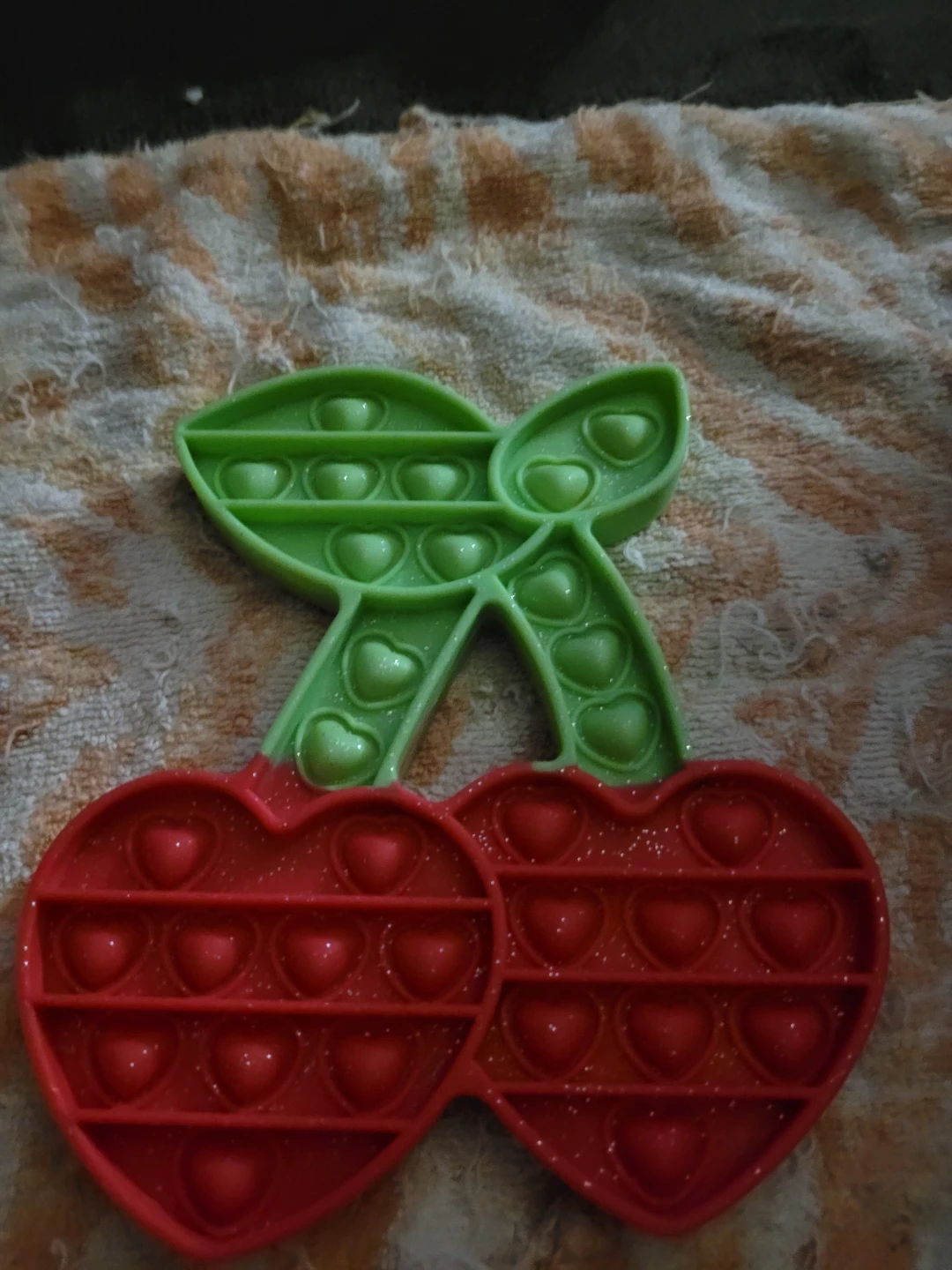 Claires cherry fidget pop it toy