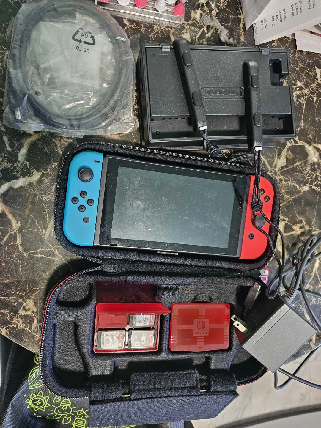 Nintendo Switch Console with Case and Games - photo 2