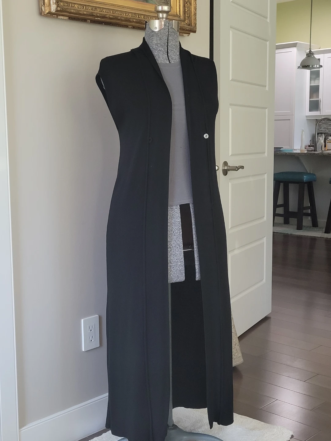 Black sleeveless long Sarah Pacini duster vest