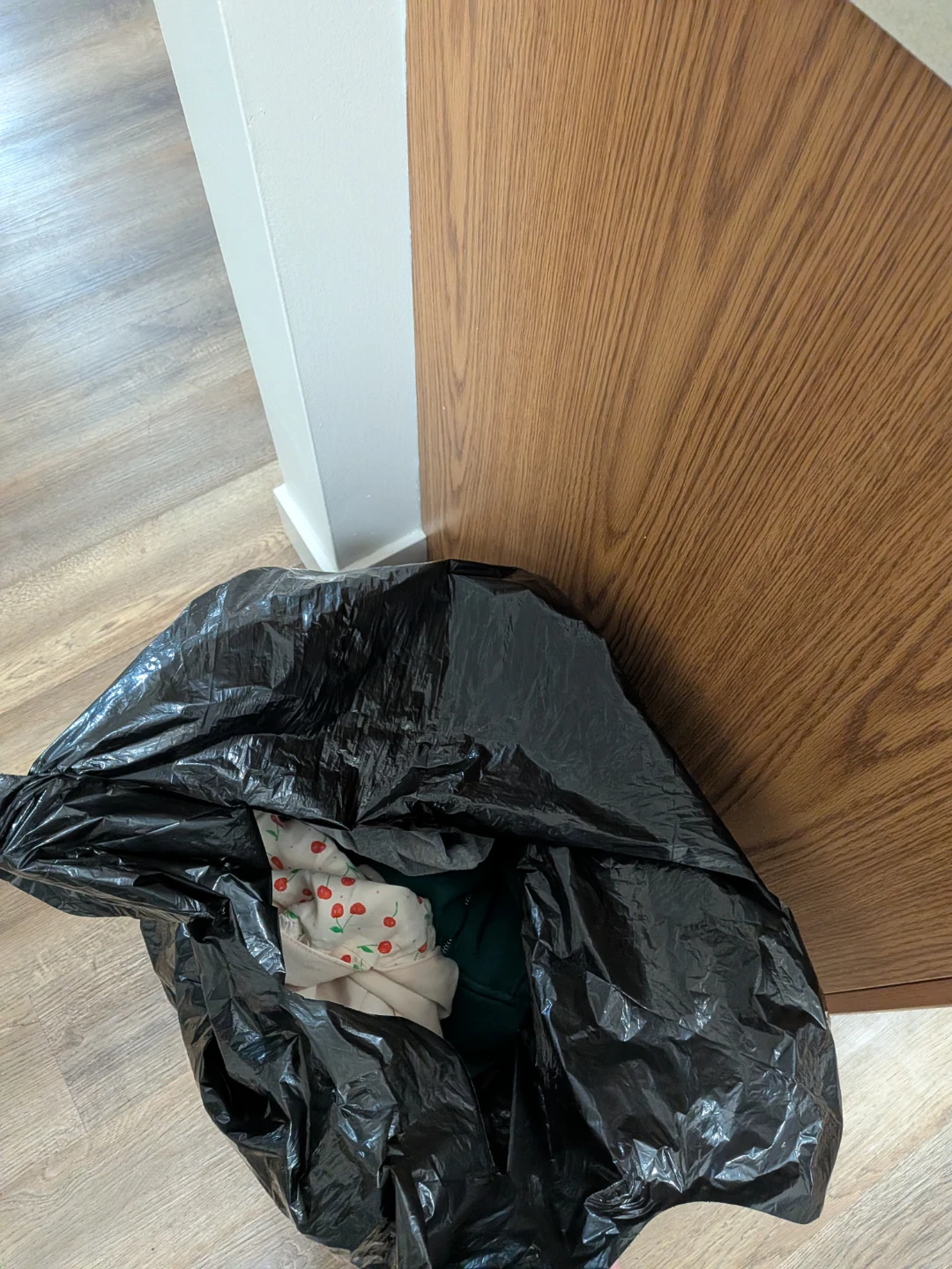Bag of assorted clothing items - photo 3