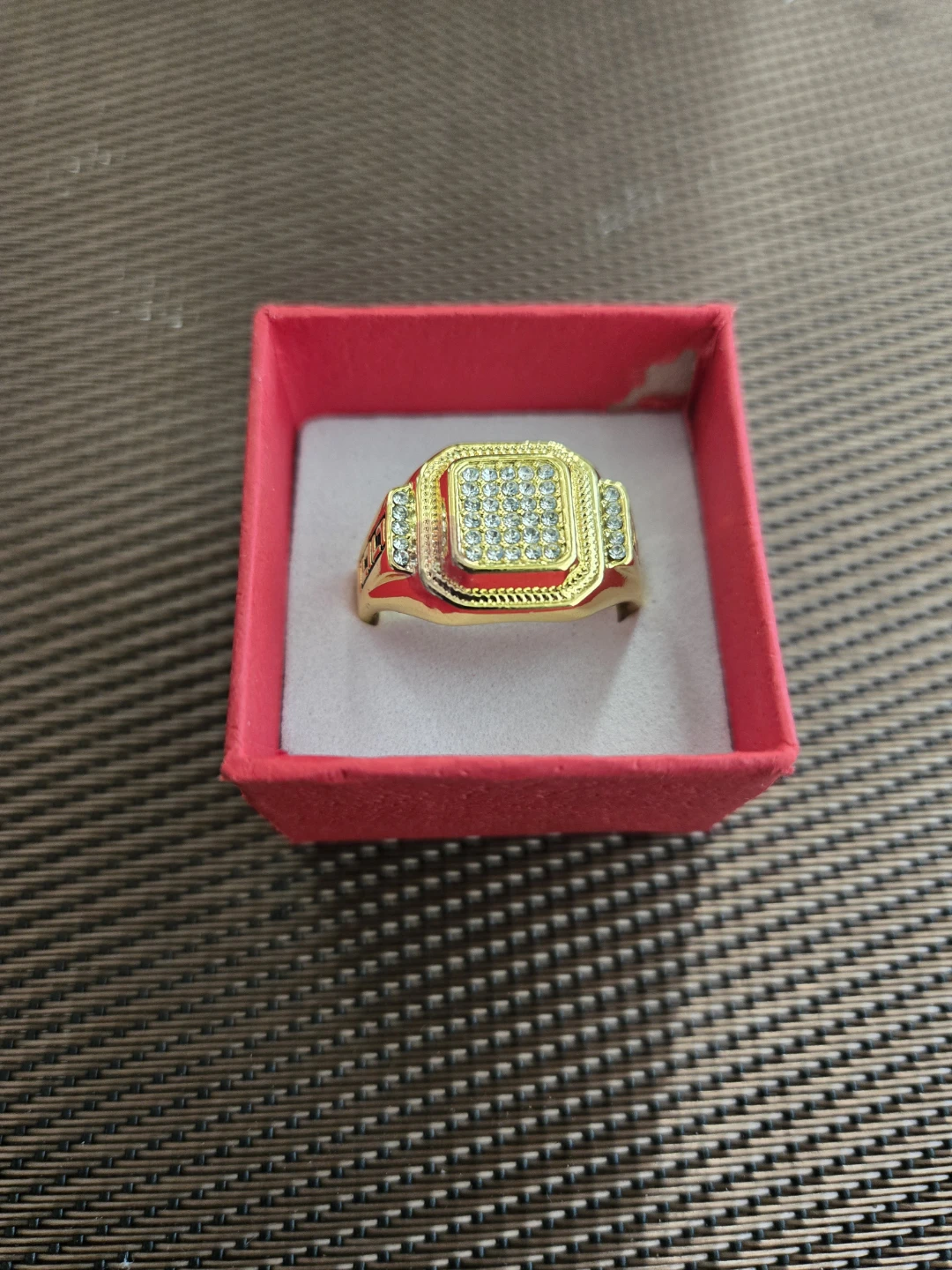 Gold-tone signet ring with clear stones