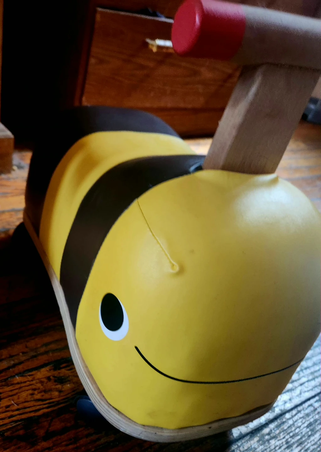 Prince Lionheart Wheely Bug ride-on toy in the Bumblebee style.