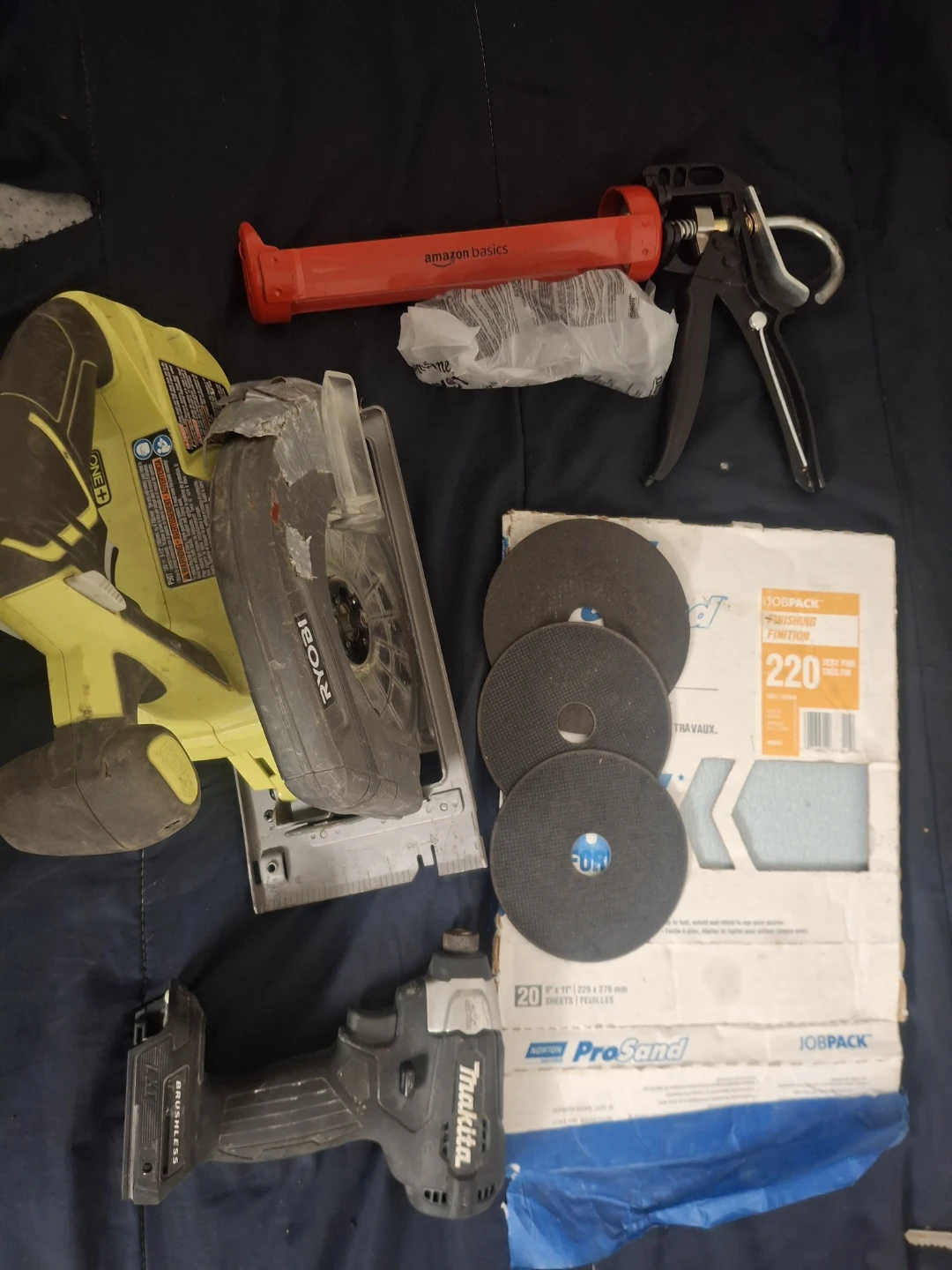Ryobi Circular Saw, Makita Impact Driver, Amazon Basics Caulking