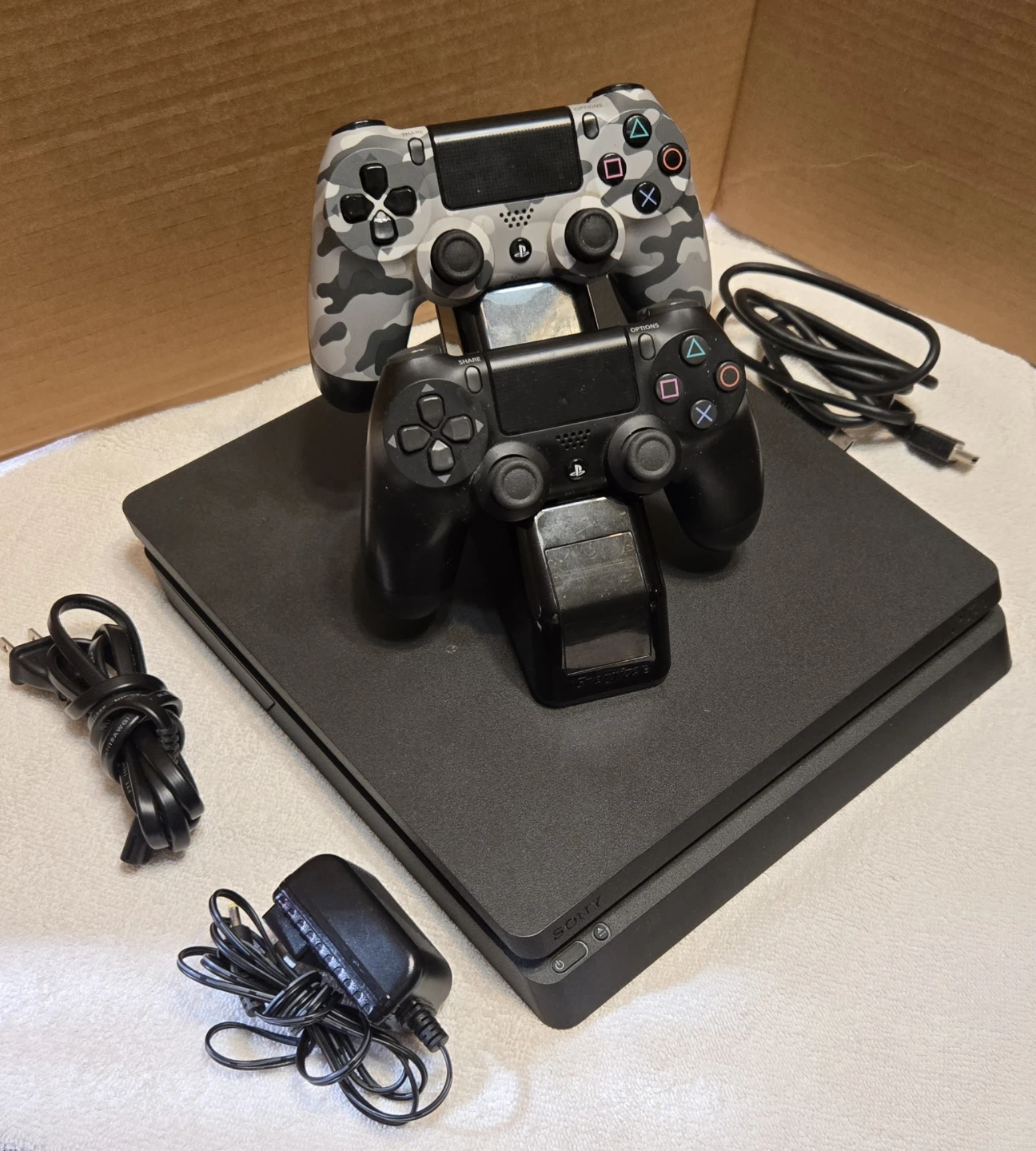 Sony PlayStation 4 Slim Console with 2 Controllers