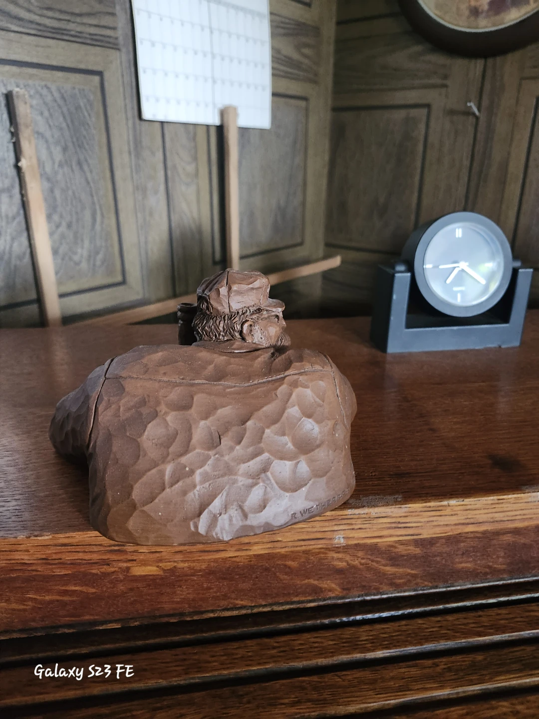 Hand Carved Wooden Figurine of a Man with a Hat and Bottle - photo 3