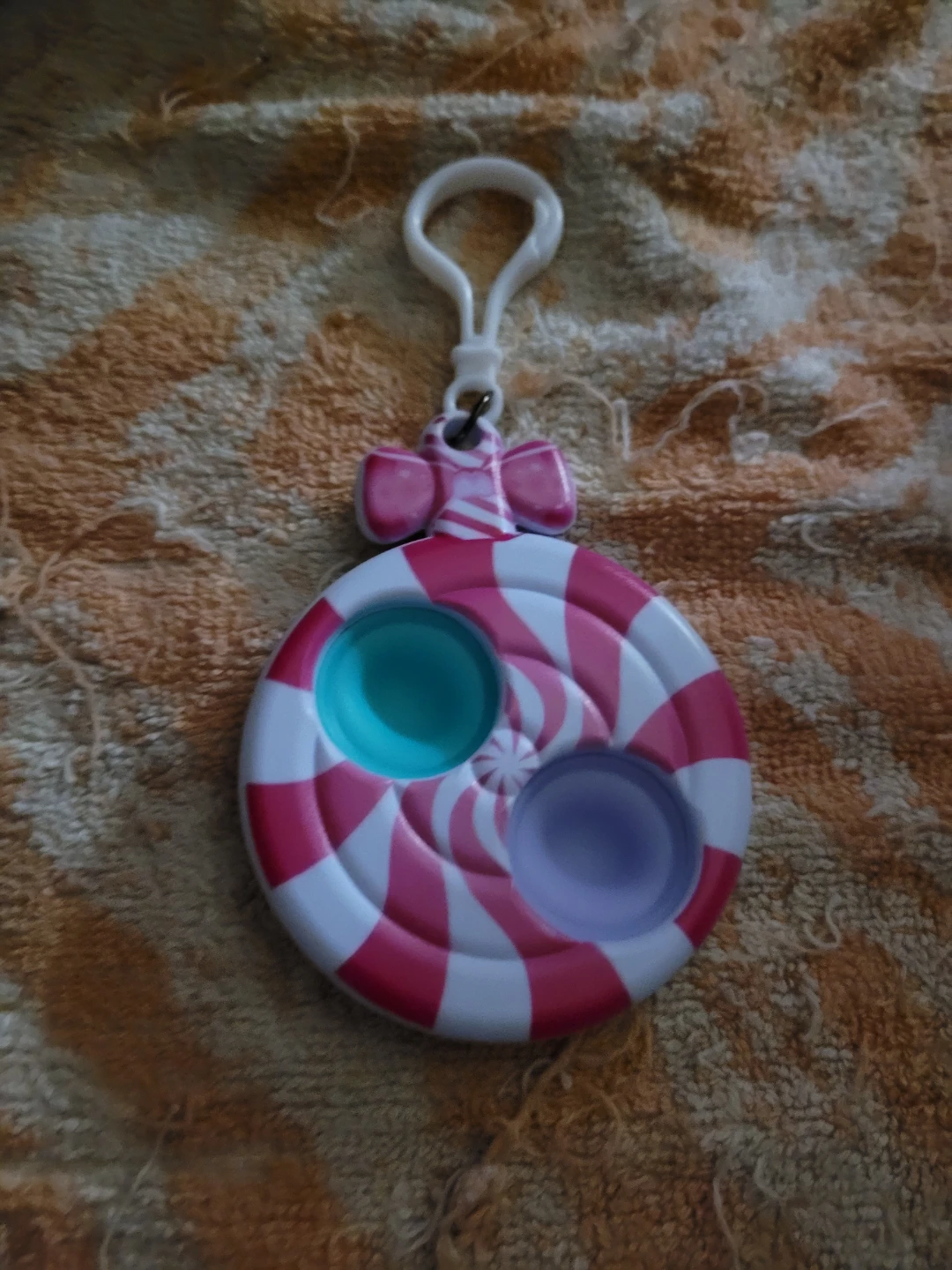 peppermint candy-themed simple-dimple fidget keychain