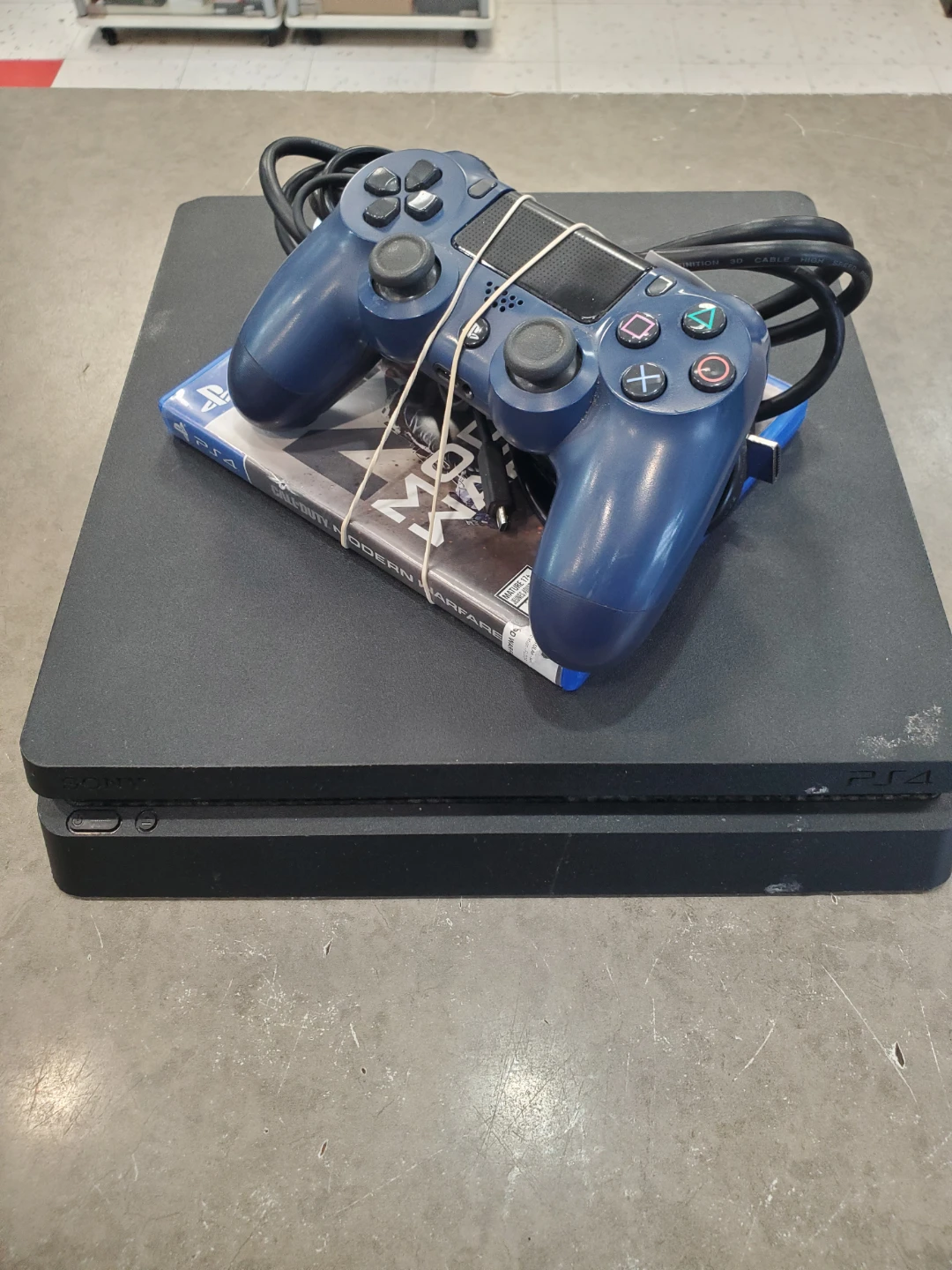 Sony PlayStation 4 Slim Console with Controller and Game