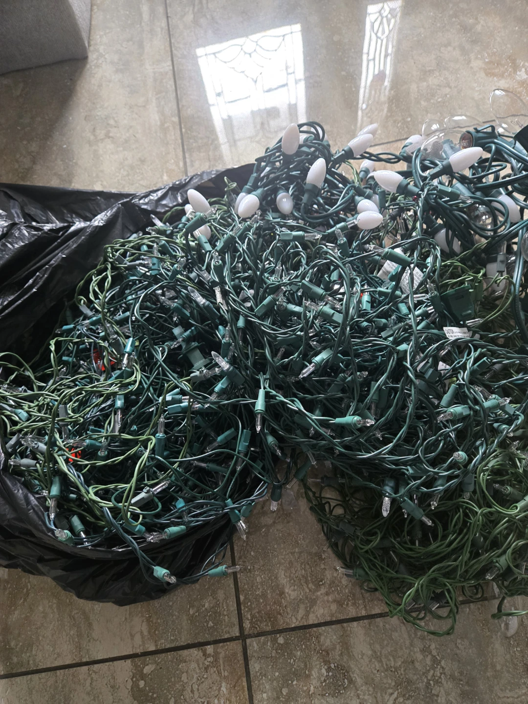 Assorted green wire Christmas string lights
