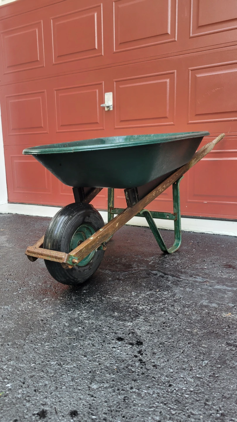 Wheelbarrow with leaf blower