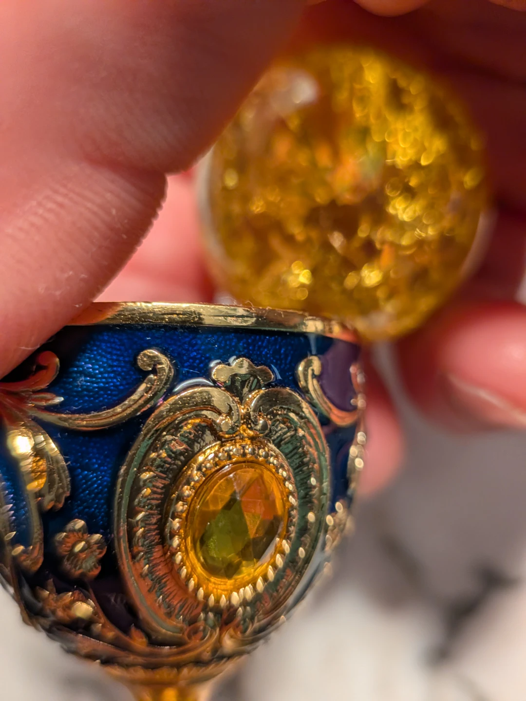 Citrine spere with trinket blue gold chalice