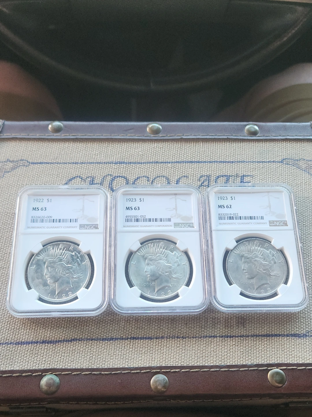 3 x 1922-1923 Peace Dollar Silver Coins NGC Graded MS63/MS62
