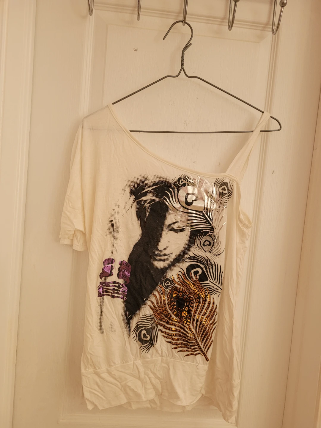 Cream coloured women's top with graphic print