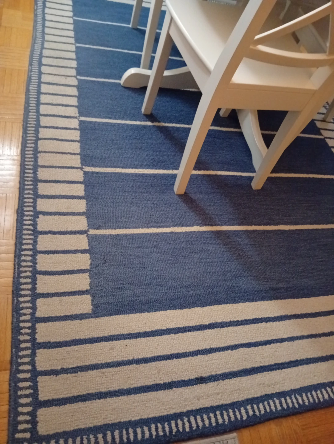 Blue and white striped rug