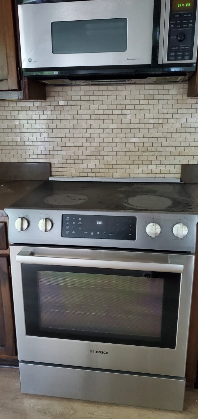 Free used Bosch electric oven range and GE microwave