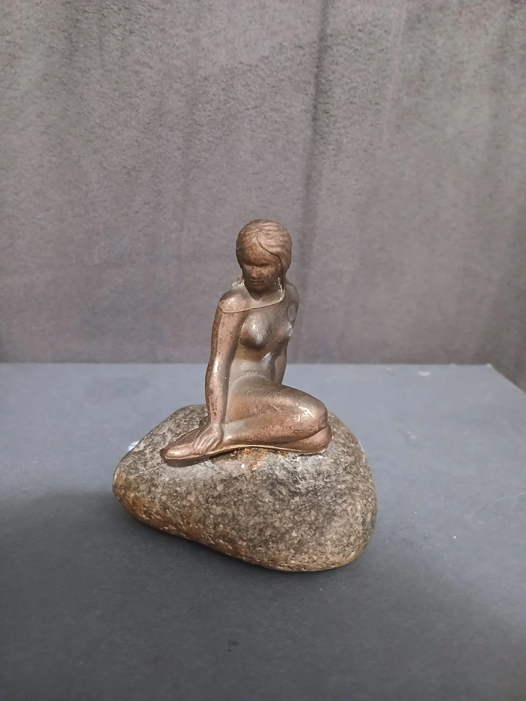 Mermaid on rock figurine
