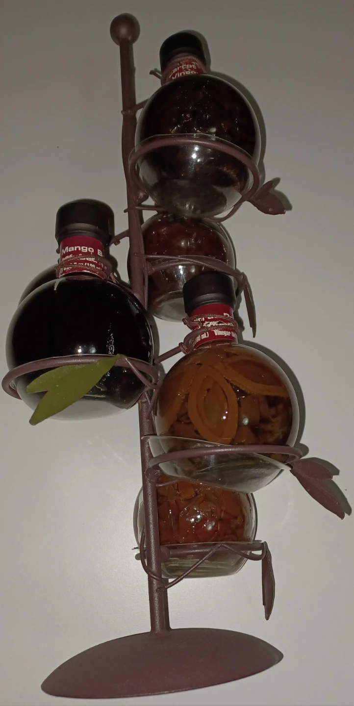 Assorted Vinegar Bottles on Stand