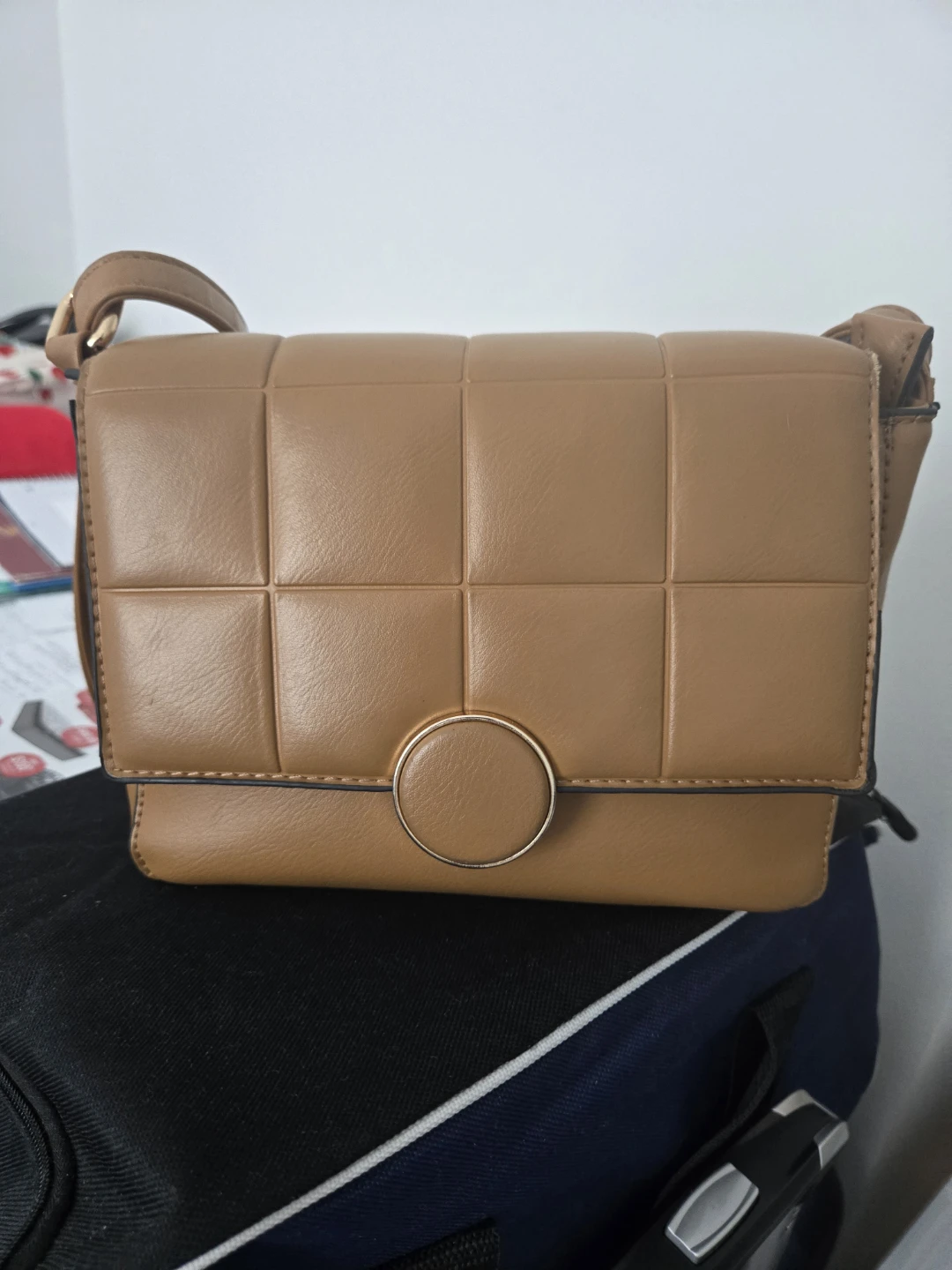 Brown Quilted Shoulder Bag with Gold Circle Clasp