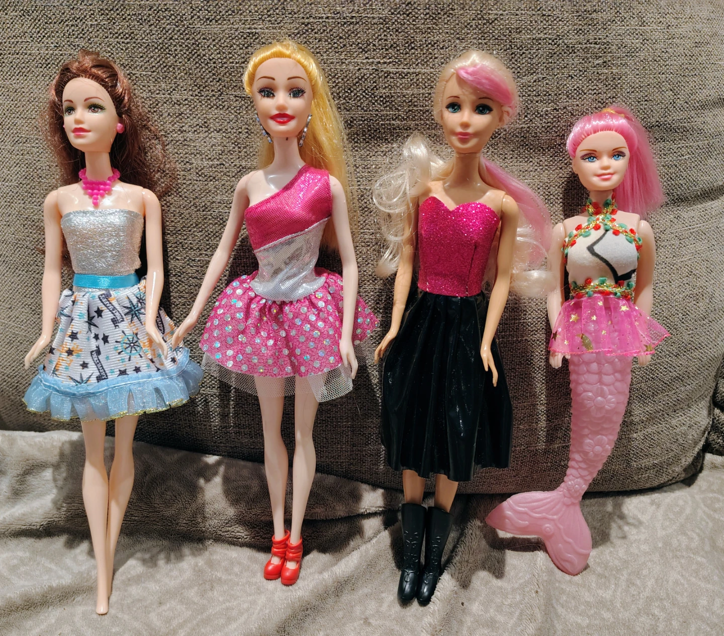 Lot of 4 Fashion Dolls